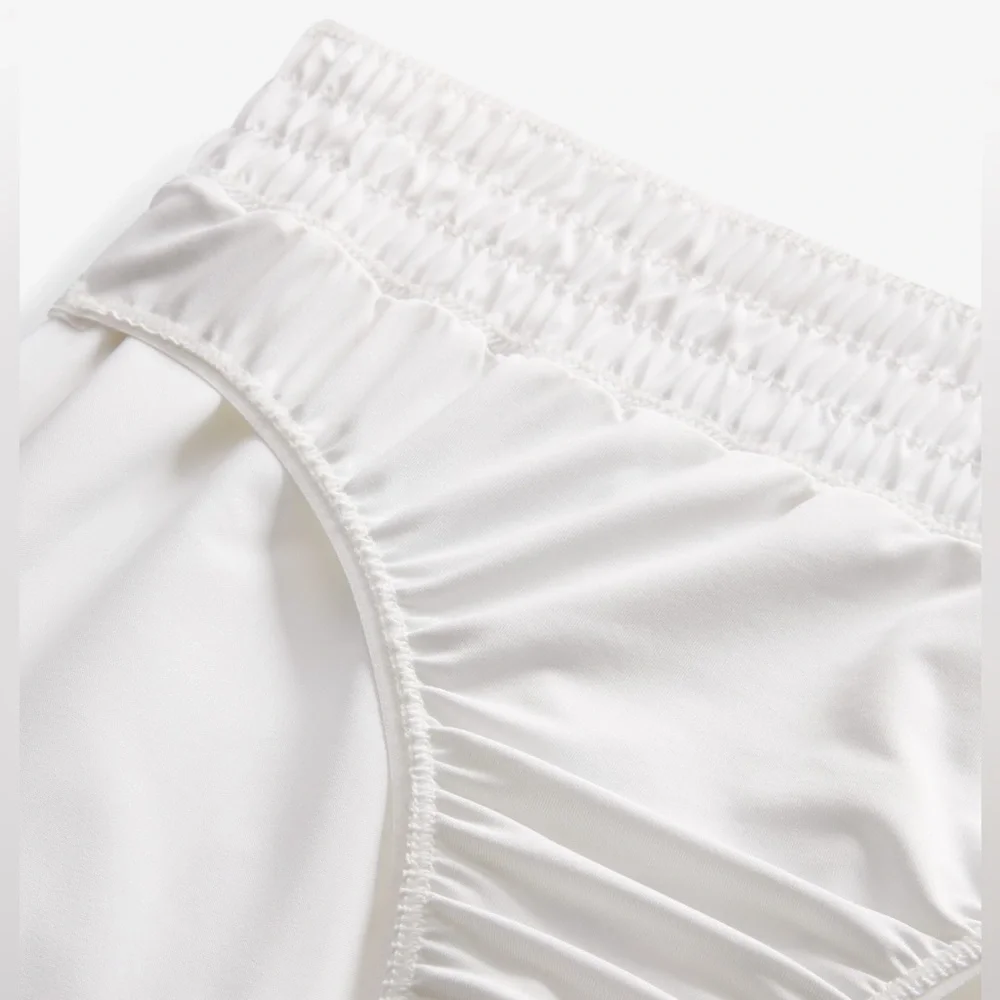 Nike Running Tempo Dri-FIT mid rise 3 inch shorts in white